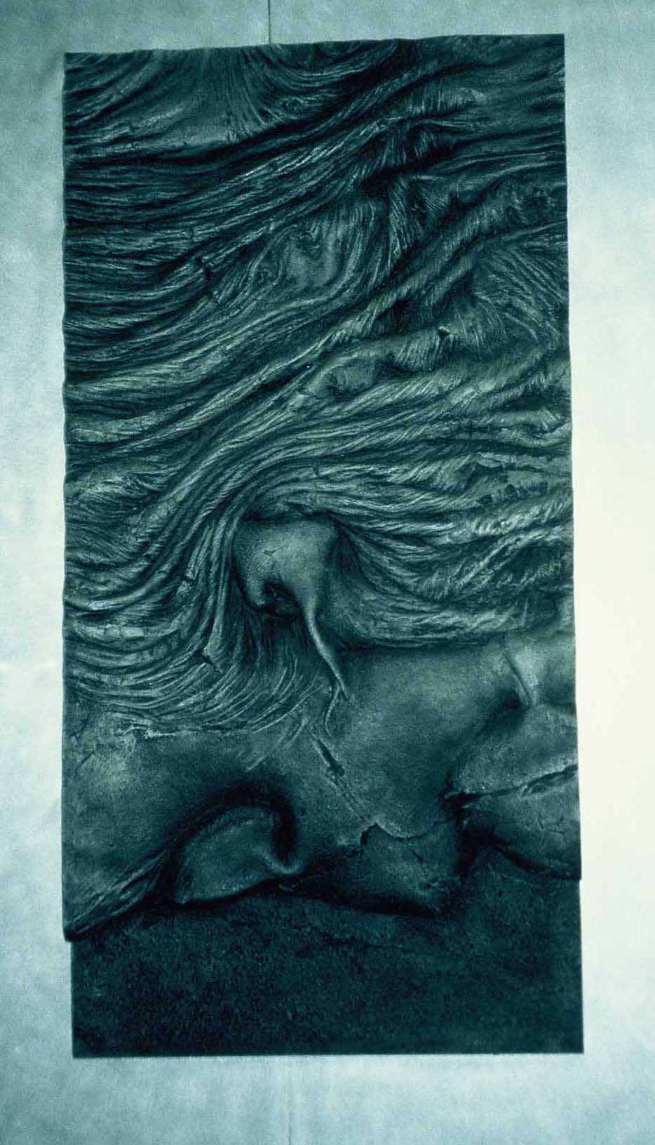 One cast aluminium panel of Windows of Fire, its surface the folds of pa hoe hoe lava