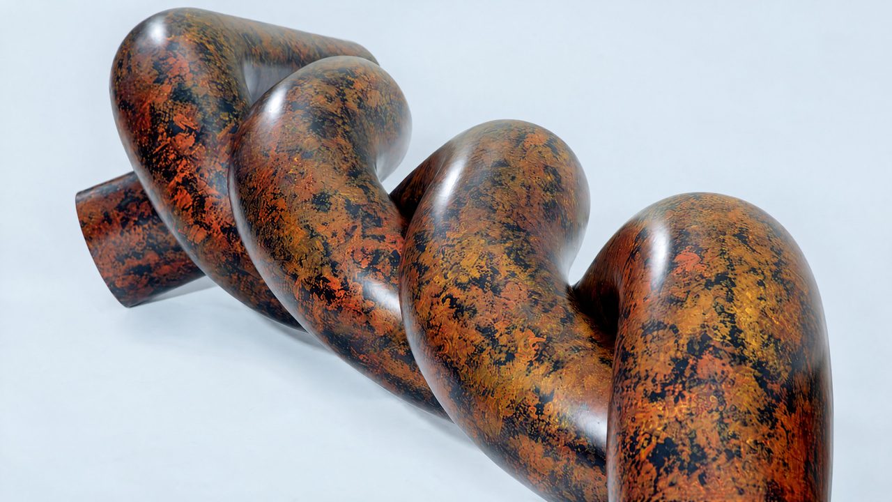 Twist, a close view of the mottled bronze-and-black coiled steel loops, by David Hamilton