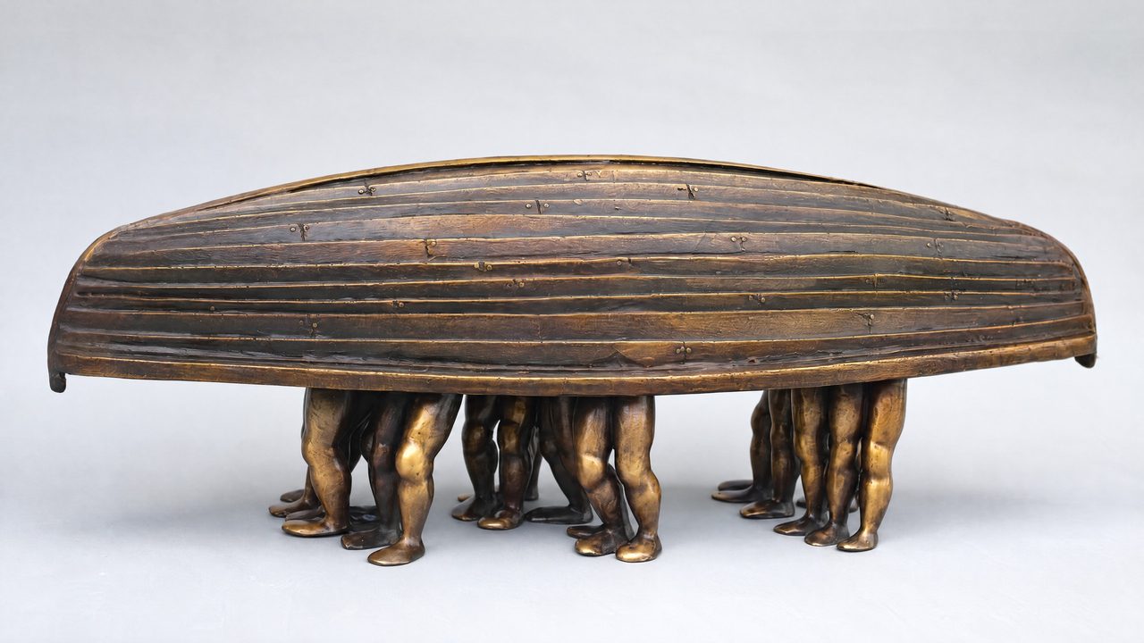 Blind Boatmen, a bronze boat hull raised on the bare legs of standing figures beneath it, by David Hamilton